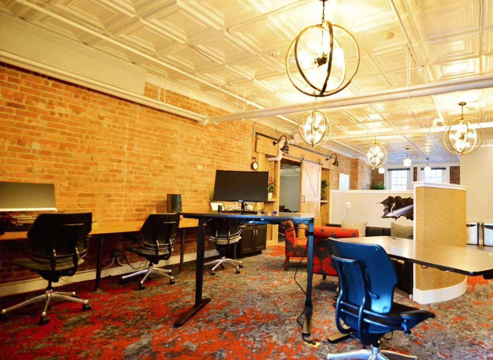 Growing co-worker space design with adjustable desks