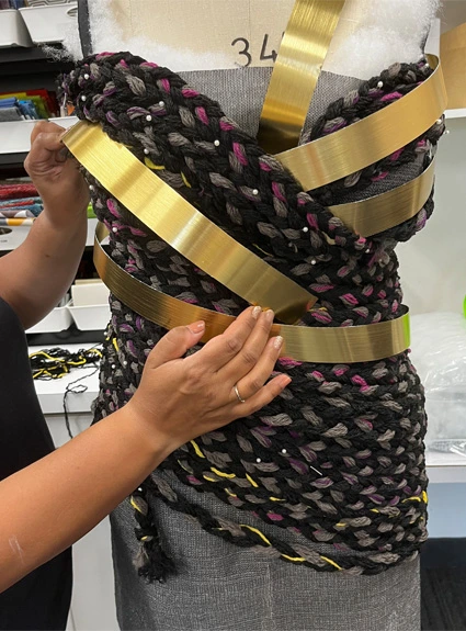 Jen putting progress on dress design