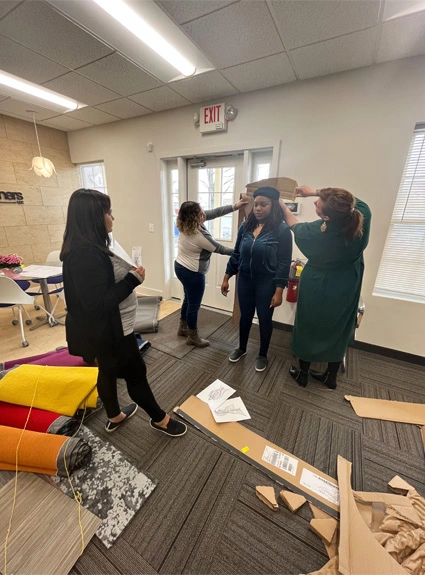 New office space under construction with office team putting elements together