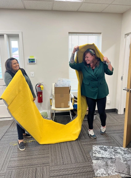 Interior designers in facility working on decorating new office space