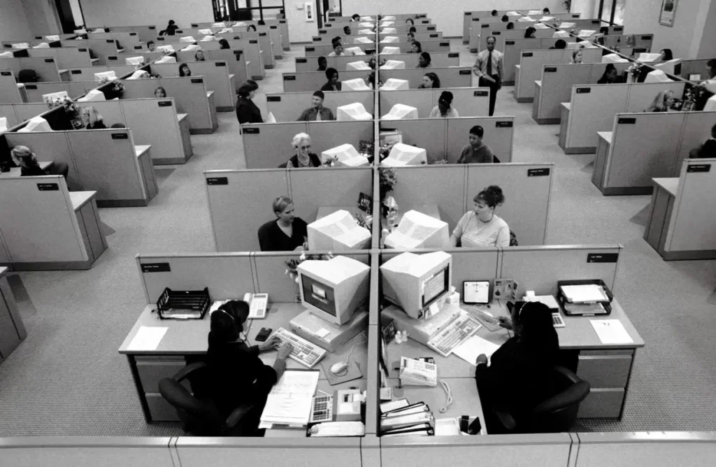 Early office design images of workers in call center office design