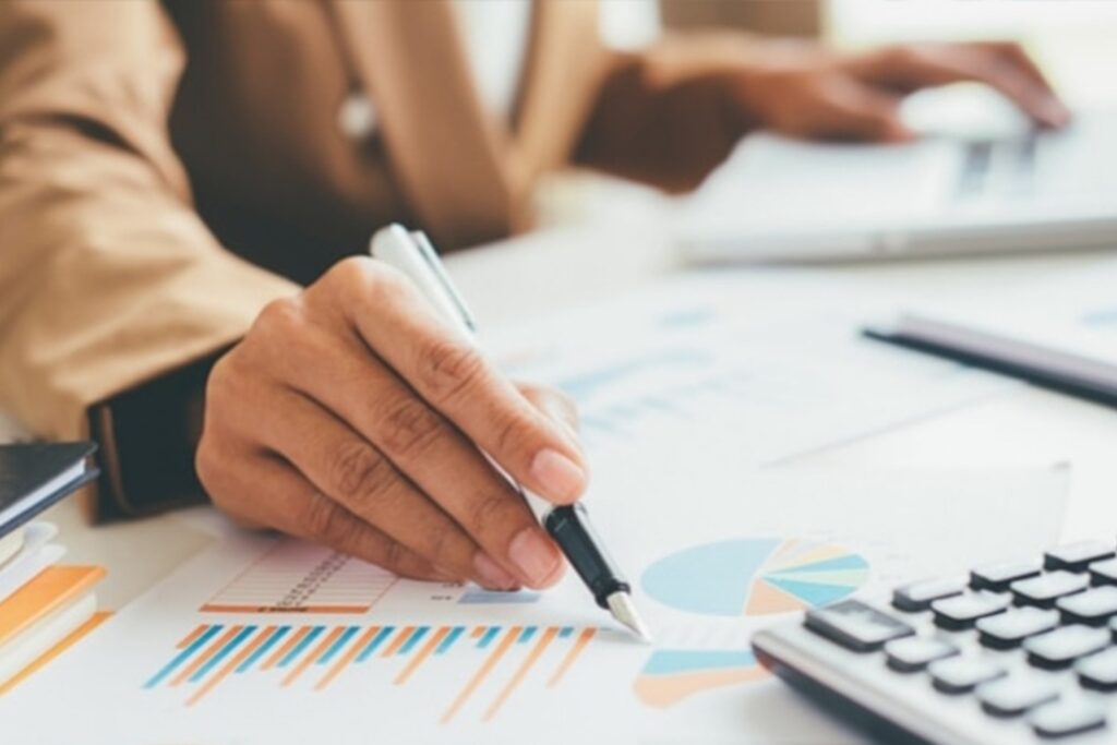 Facility management design and person drawling on paper