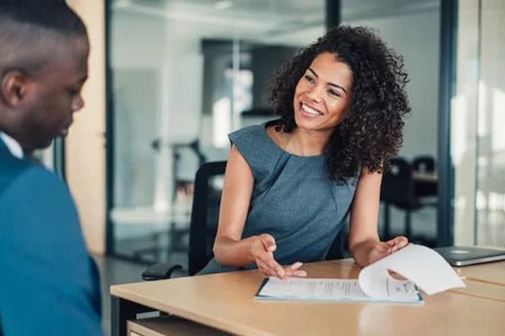 Designer review facility management project with client