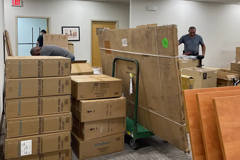Facility Management project with team moving corporate office materials and supplies