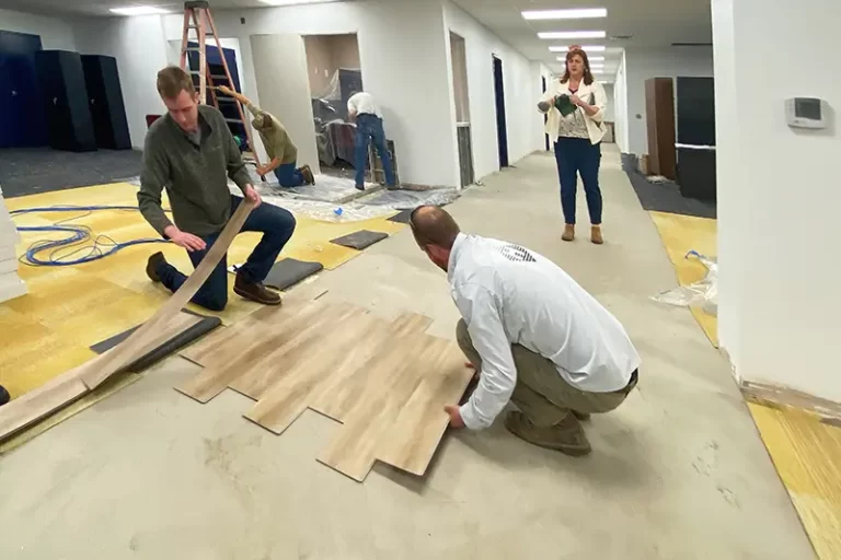 Vendor coordinating interior design work on office space