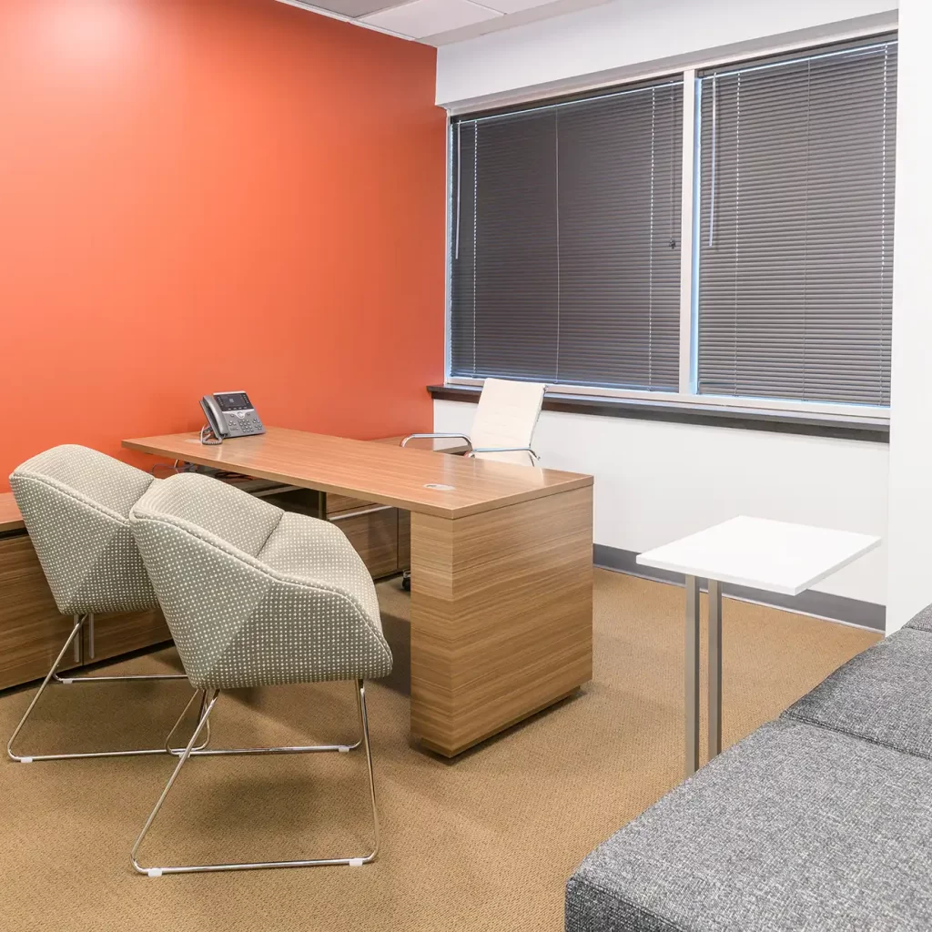 Private Office with thin desk and couch